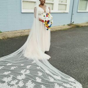 Elegant Cream Lace Wedding Dress with Train